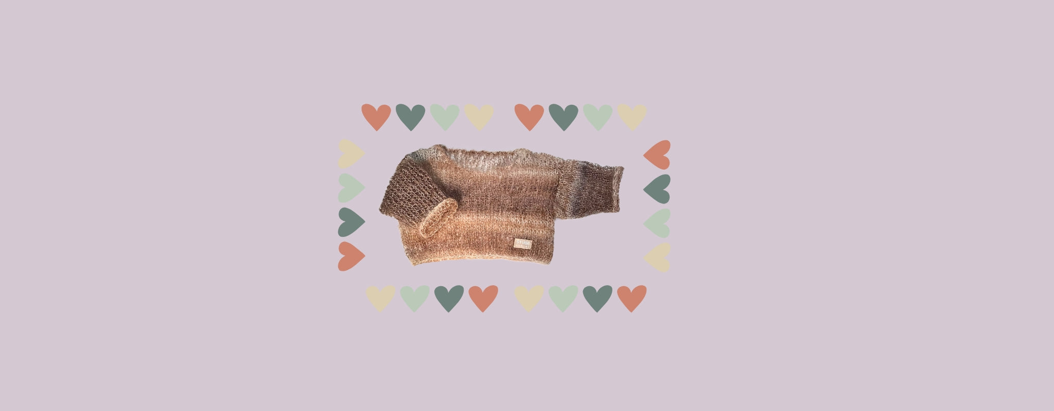 Handgestrickter Kinderpullover mit Herzen