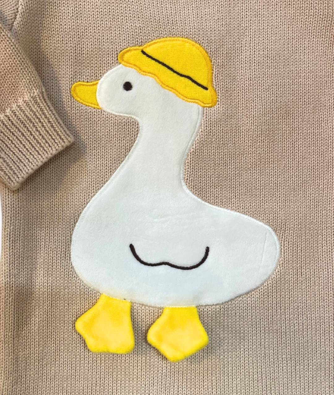 Baby Strickstrampler mit Ente Detailansicht