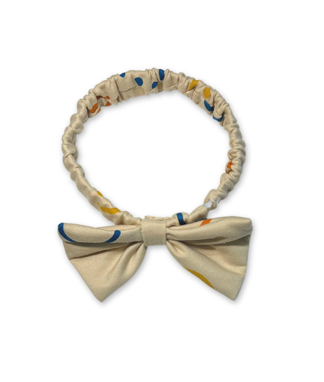 Detailansicht des passenden Haarbands zum Babystrampler mit Smiley-Motiven